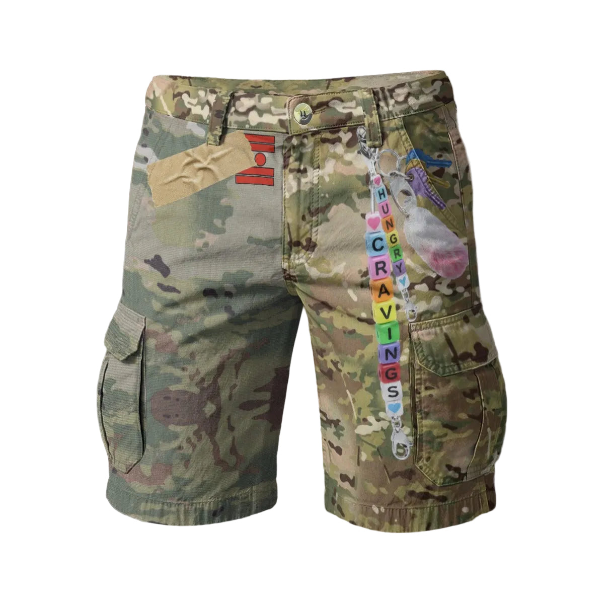 Camouflage shorts with colorful patches and text on a blurred background